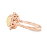 Oval Opal and Diamond Halo Ring in Rose Gold