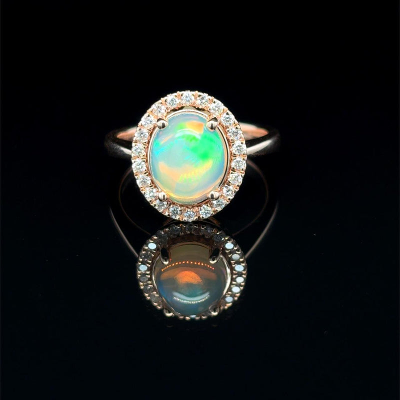 Oval Opal and Diamond Halo Ring in Rose Gold