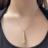 Brushed Gold Pendant Encircled with Diamonds